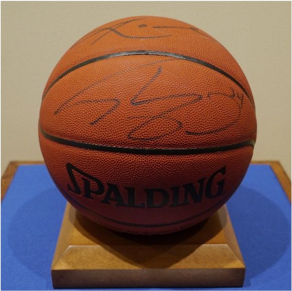 A Spalding basketball signed by Kobe Bryant and Shaquille O'Neal