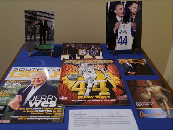A selection of documents and magazines concerning Jerry's post-Lakers career. One includes a photo of Barack Obama holding a number 44 jersey. 
