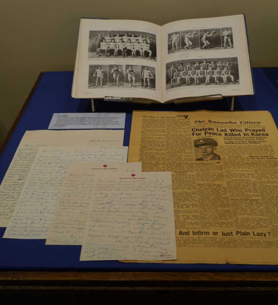 A selection of documents including letters from David West and an article announcing his death