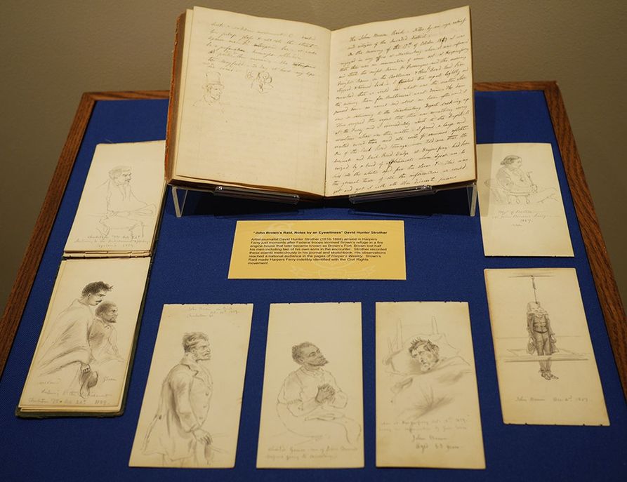 Documents pertaining to David Hunter Strother's witnessing of the storming of Harper's Ferry. Included are a notebook and several sketches 
