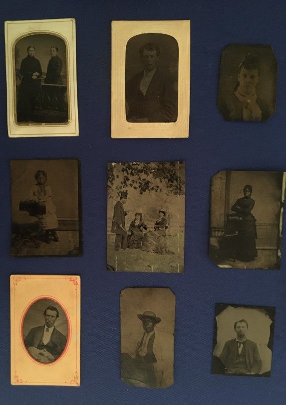 A selection of nine tintype portraits displayed on a blue background.  