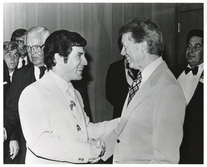 Photograph of Congressman Rahall shaking hands with President Jimmy Carter